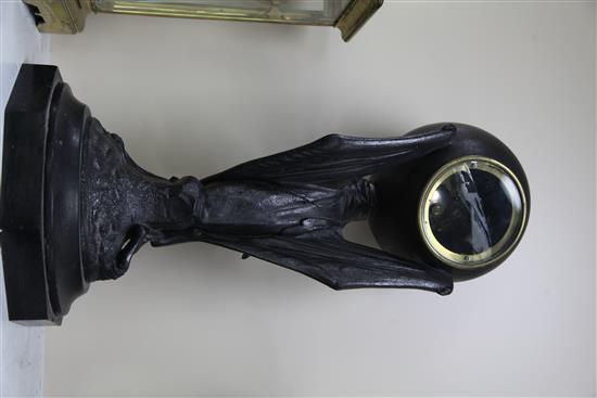 T. Lemaire. A cast iron mantel clock, 21in.